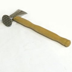 Popychacz do mięsa z tasakiem